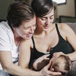 lesbian couple with a new born baby born thanks to Fertility in community